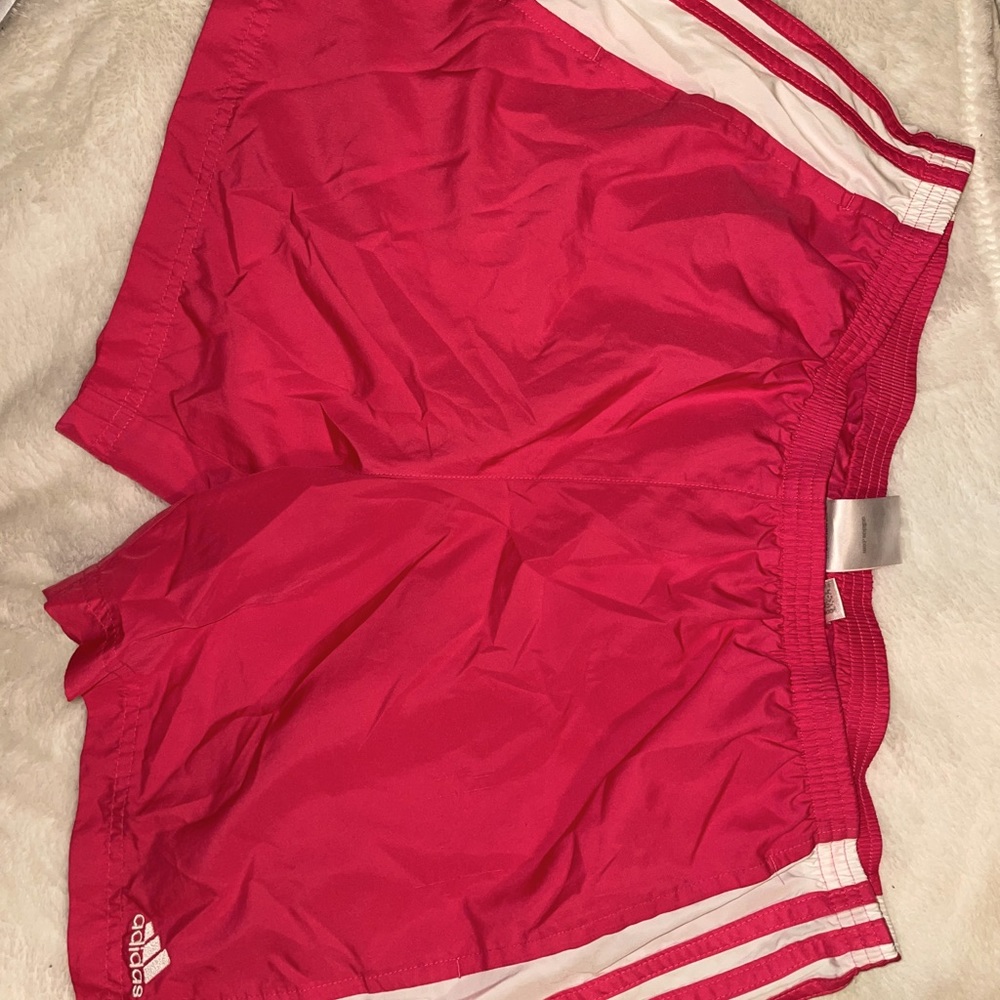 Cute pink Adidas shorts.
